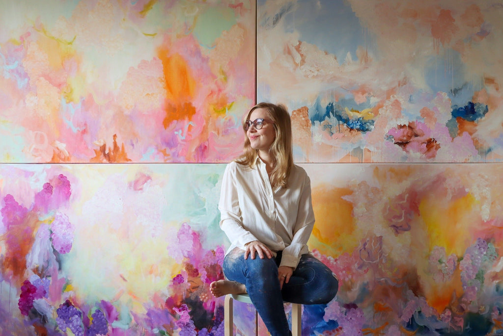 Finnish abstract painter, fine artist Sanni Olasvuori in studio with her large oil paintings
